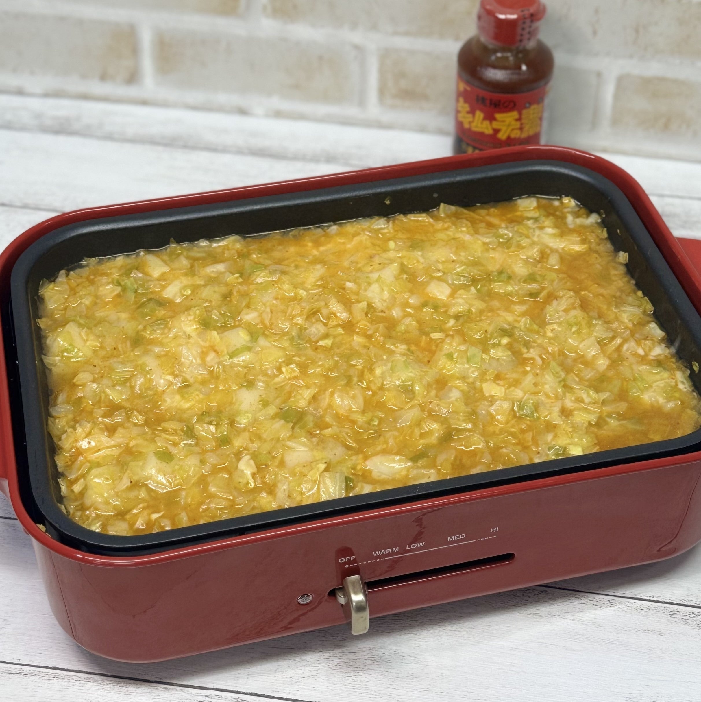とろ～りチーズと おもちに うま辛な味わいがマッチして やみつきに